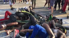 NYC: J’Ouvert Revelers Grind on Street in Welter of Painted Bodies