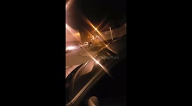 Car hits pavement at high speed and barrel rolls into the road