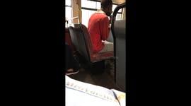 Shocked morning commuter films man 'smoking crack pipe' on top deck of London bus