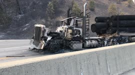 Semi-truck scorched by fire burning dangerously close to Shasta County interstate