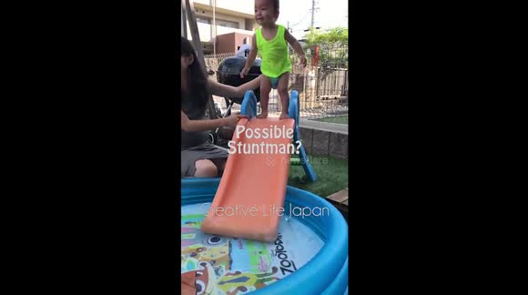 Child Fail - Child stands on slide and slips down - Buy, Sell or Upload Video Content with Newsflare