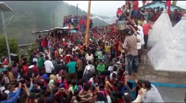 Shocking moment spectators fall from roof during village fair