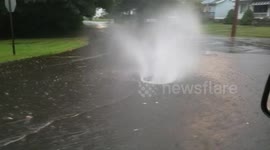 Manhole cover nearly bursts off after downpour in Connecticut