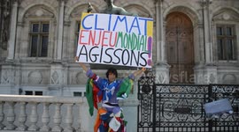 Voltuan (Jean-Baptiste Redde, a famous militant on different causes, always bearing a big sign with his arms outstreched in all protests) at the March for the climate. 8 september 2018. Town hall of Paris to Place de la République, France.