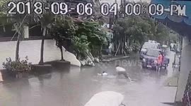 Girl, 9, electrocuted on flooded road before hero passer-by saves her