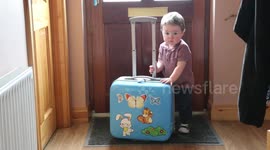 An impatient kid waiting for the postman.