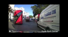 Minicab driving the wrong way around Hyde Park Corner