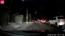 Motorcyclist saved by his helmet after SUV runs over his head