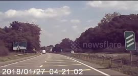Shocking moment speeding van is filmed flying over roundabout