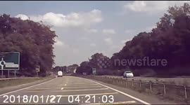 Shocking moment speeding van is filmed flying over roundabout