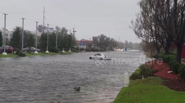 Car trapped in flooding in Wilmington, North Carolina