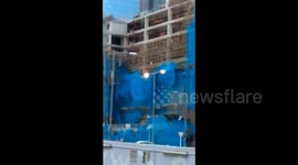 Scaffolding on building falls apart after Typhoon Mangkhut hits Hong Kong