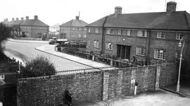 *textless* Council accused of reigniting a ‘class war’ after resurfacing the posh end of a street - to the spot where a wall once divided council houses from rich neighbours
