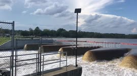 Hope Mills Dam holds strong under the pressure of heavy flood waters