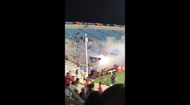 Stadium fans light up flares to celebrate Zurich's penalty goal
