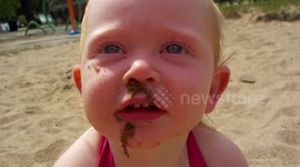Funny Sandy Snots On a Toddler