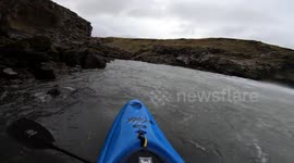 GoPro POV of Adrian Mattern being the first human kayaking down infamous Markarfljótsgljúfur waterfall in southern Iceland
