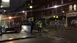 Midnight charity walkers brave the rain and the drunks