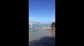Cars caught in Spring Equinox Spring Tide, Sept, South Africa, Eastern Cape, Boesmansriviermond