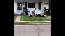 Women pulls window off house, is beaten to ground by owner