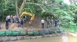 Police dig garden of missing British man and wife as three 'hitmen' confess to murder