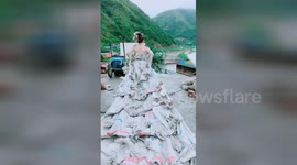 Talented woman uses 40 cement bags to make beautiful wedding dress