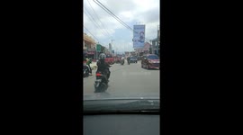 this woman riding motor cycles style