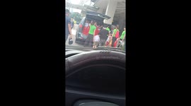 School kids crammed into car boot like sardines