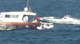 Power boat races, where one Speed boat almost smashes into a spectators boat, missing by just a few feet.