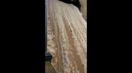 Water gushing out of dam