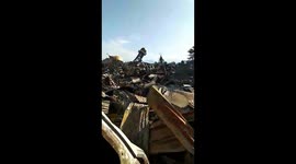 Our home complex after an earthquake, landslide, and burning