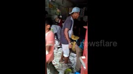 People in Donggala loot shops four days after earthquake and tsunami