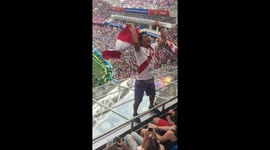 Enthusiastic  Peru football fan encouraging everyone to support the team