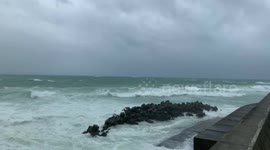 Waves crash on Okinawa beach as typhoon brings strong winds and rains to Japan's south