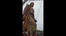 Giant puppets take over Liverpool