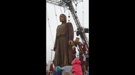Giant puppets take over Liverpool