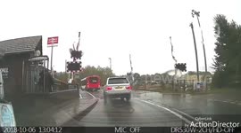 Girl gets splashed by a puddle