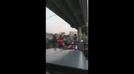 Motorcycle rage causes punch-up on busy road