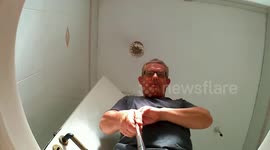 FLUSHING A CAMERA DOWN THE TOILET.