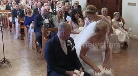 Irish Brides veil is pulled out by mistake but saved by photographer