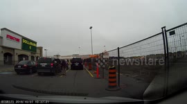 Senior woman falls down in parking lot, hits head