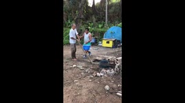 Trapped python rescued after getting tangled in net