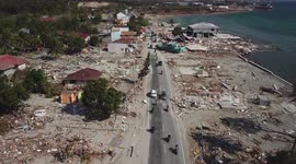 Stranded fishing boats and lone minarets: Last-ditch rescue efforts in Indonesia amid ruins