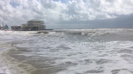 Double red flags raised as monstrous waves attack Dauphin Island beach ahead of Hurricane Michael landfall