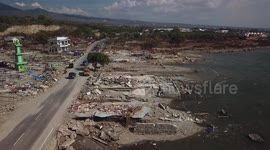 Drone footage shows the devastation as the Tsunami swept over the villages destroying everything in it's path.