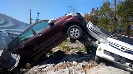 Dozens of cars were damaged in the city of Palu