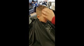 Son falling asleep in the Hairdresser's