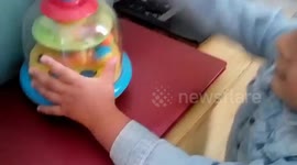 Spinning balls popper toy