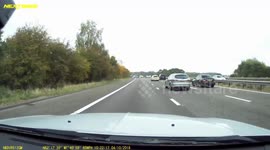 Autumnal trees on the M40 Motorway plus a couple of Police Cars