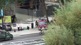Firefighters arrive at the scene of the Lea Bridge flood